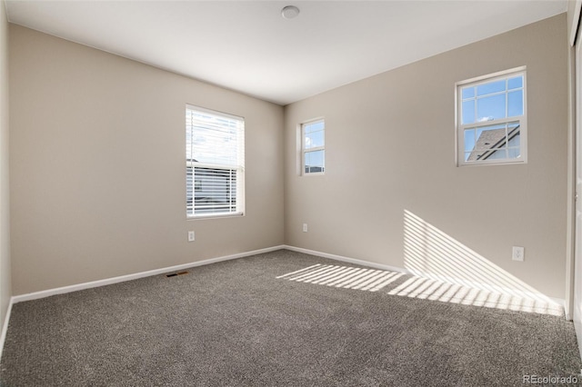 view of carpeted spare room