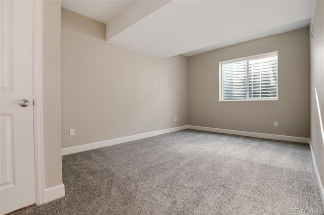 spare room with carpet flooring