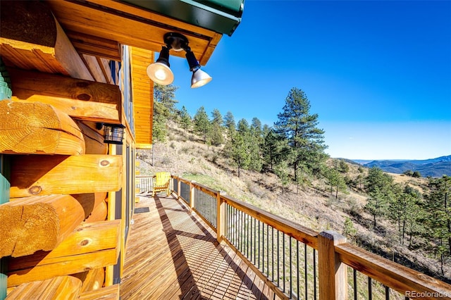 31266 Half Peak Trl, Pine, CO 80470 - wooden deck with a mountain view