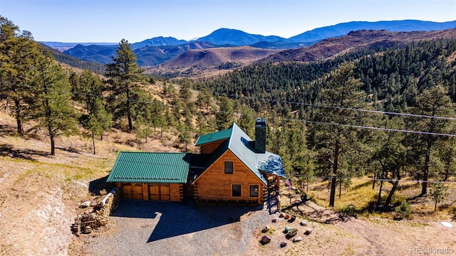 31266 Half Peak Trl, Pine, CO 80470 - view of mountain backdrop featuring a forest