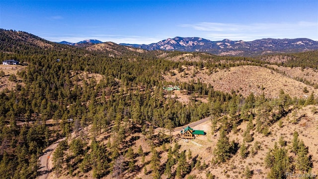 31266 Half Peak Trl, Pine, CO 80470 - mountain view with a heavily wooded area