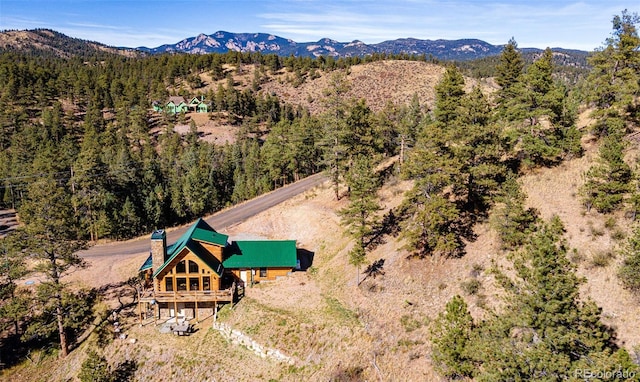 31266 Half Peak Trl, Pine, CO 80470 - view of subject property with a forest and mountains
