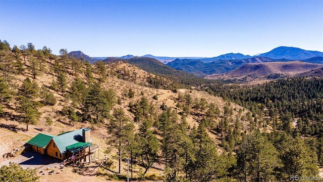 31266 Half Peak Trl, Pine, CO 80470 - view of mountain background with a forest