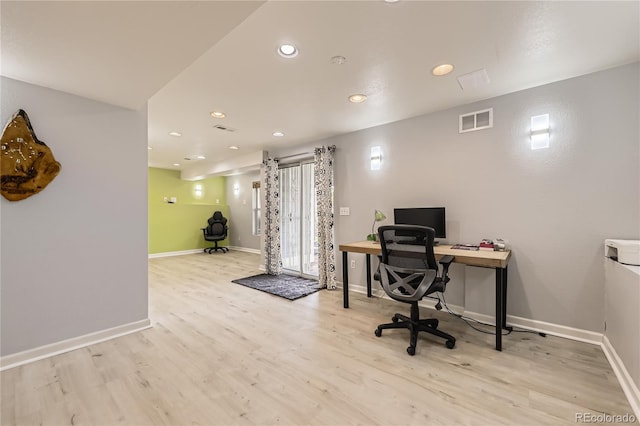 office featuring wood finished floors, baseboards, and recessed lighting