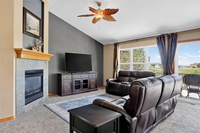 34827 E 7th Ave, Watkins, CO 80137 - living room with carpet floors, a tile fireplace, ceiling fan, and high vaulted ceiling