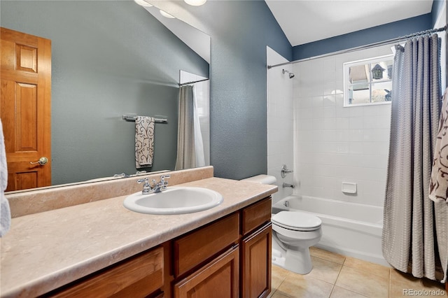34827 E 7th Ave, Watkins, CO 80137 - full bathroom with vanity, shower / bathtub combination with curtain, tile patterned floors, and vaulted ceiling