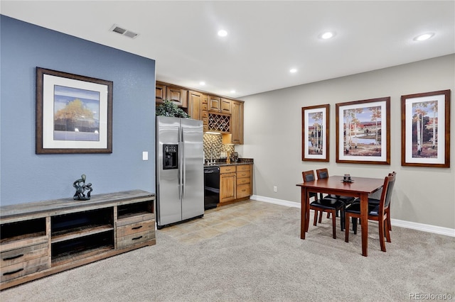 34827 E 7th Ave, Watkins, CO 80137 - dining space with bar, recessed lighting, and light colored carpet