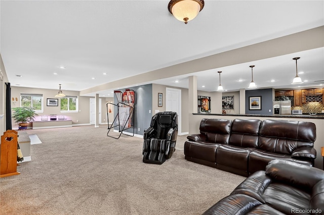 34827 E 7th Ave, Watkins, CO 80137 - living room featuring light colored carpet and recessed lighting