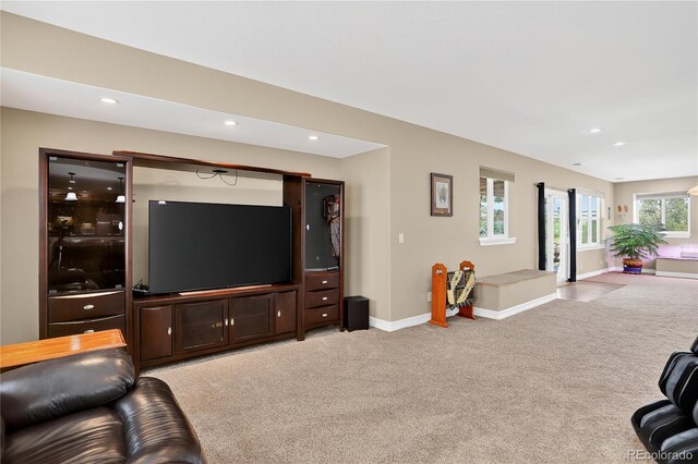 34827 E 7th Ave, Watkins, CO 80137 - living area featuring light carpet and recessed lighting