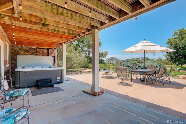 34827 E 7th Ave, Watkins, CO 80137 - view of patio / terrace with a hot tub and outdoor dining area