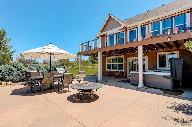 34827 E 7th Ave, Watkins, CO 80137 - patio / terrace featuring a fire pit, a patio area, and outdoor dining space
