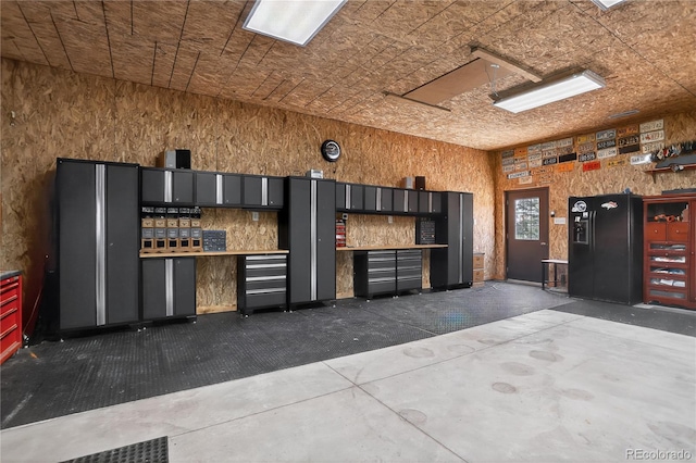 34827 E 7th Ave, Watkins, CO 80137 - miscellaneous room with concrete floors