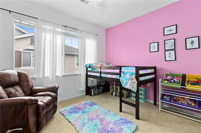 bedroom featuring carpet, baseboards, and a ceiling fan