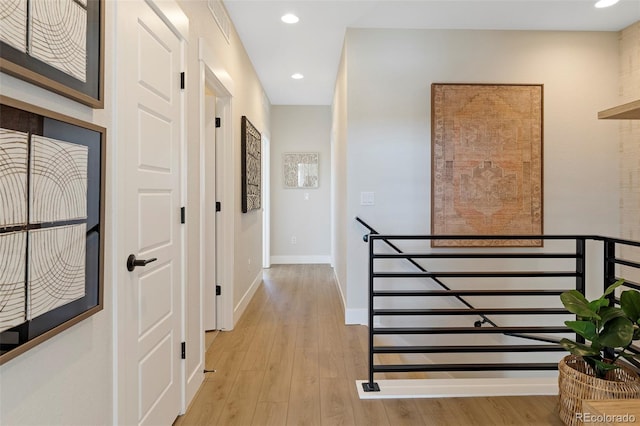 hall featuring light hardwood / wood-style floors