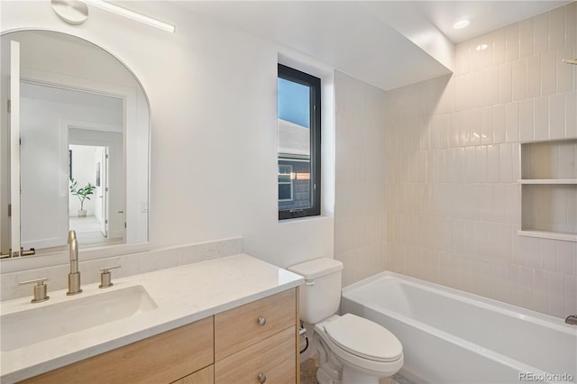 full bathroom featuring shower / tub combination, vanity, and toilet