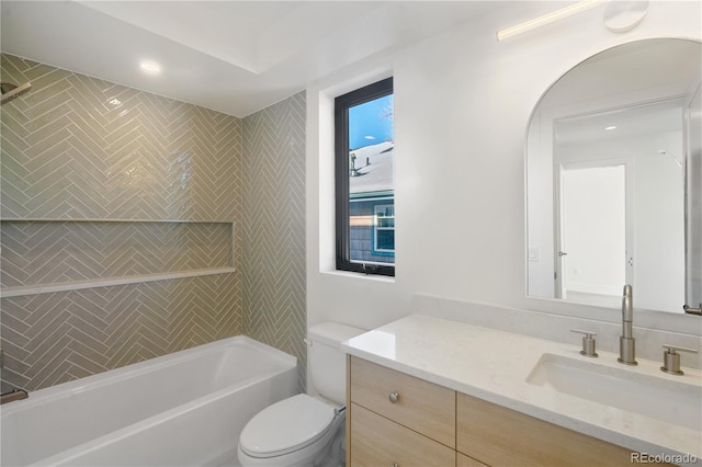 full bathroom featuring vanity, toilet, and tub / shower combination