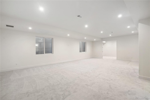 basement with light colored carpet