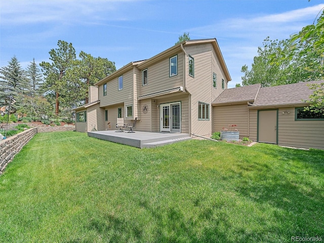 31412 N Bermuda Dunes Dr, Evergreen, CO 80439 - back of house featuring a yard