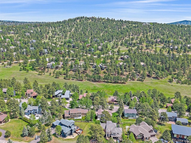 31412 N Bermuda Dunes Dr, Evergreen, CO 80439 - aerial view of property and surrounding area with a forest and nearby suburban area