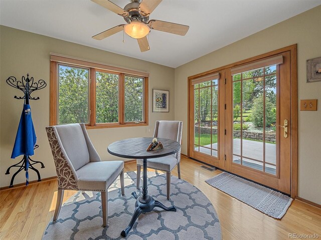 31412 N Bermuda Dunes Dr, Evergreen, CO 80439 - dining space featuring plenty of natural light, light wood finished floors, ceiling fan, and baseboards