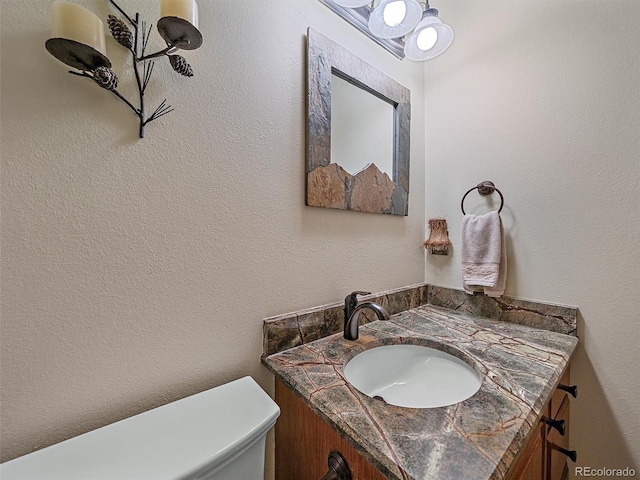 31412 N Bermuda Dunes Dr, Evergreen, CO 80439 - bathroom with vanity and toilet