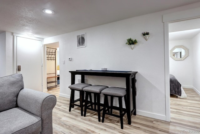 361 N Raleigh St, Denver, CO 80219 - dining area with light wood-type flooring and recessed lighting
