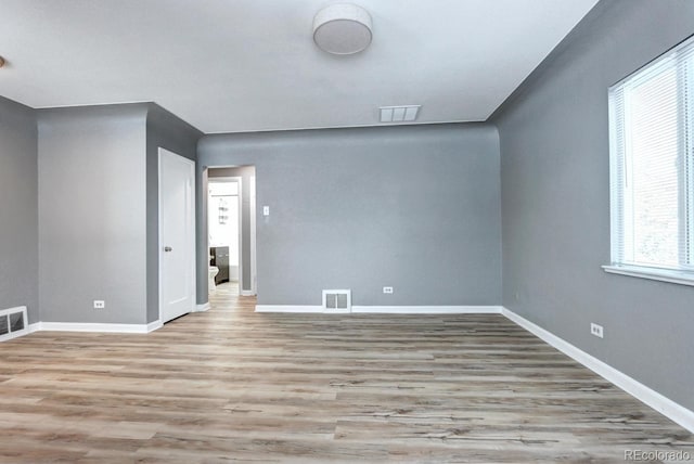 361 N Raleigh St, Denver, CO 80219 - empty room with wood finished floors and baseboards