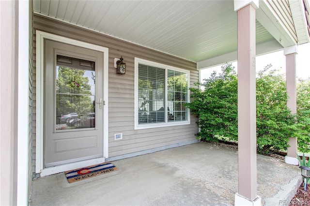 5400 Perth St, Denver, CO 80249 - doorway to property featuring a porch