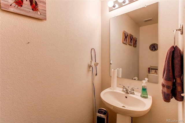 5400 Perth St, Denver, CO 80249 - bathroom featuring a sink