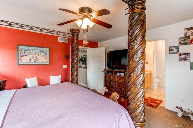 5400 Perth St, Denver, CO 80249 - bedroom with light carpet, ensuite bath, ceiling fan, and baseboards