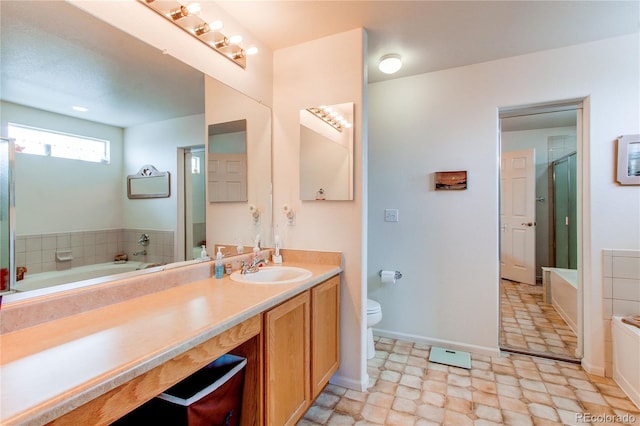 5400 Perth St, Denver, CO 80249 - full bathroom with vanity, a bath, toilet, and a stall shower