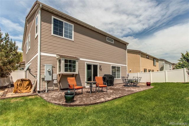 5400 Perth St, Denver, CO 80249 - rear view of house with a patio area