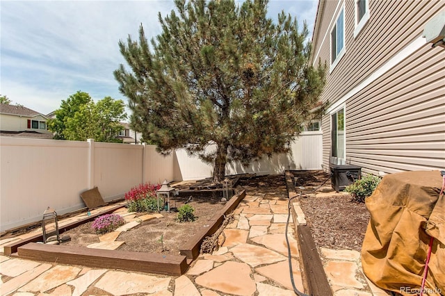 5400 Perth St, Denver, CO 80249 - fenced backyard featuring a patio and cooling unit