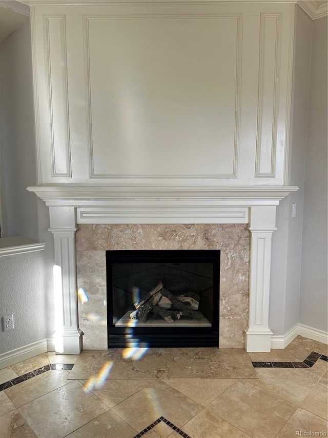 interior details featuring a premium fireplace