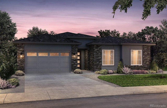 view of front of property with a garage