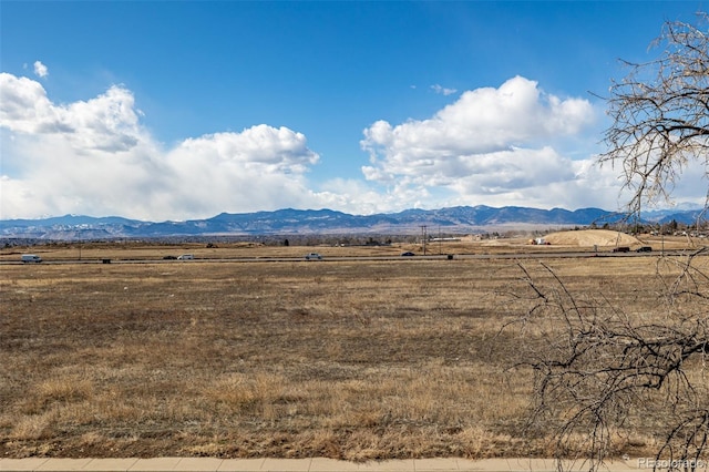 view of mountain feature with a rural view