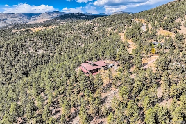 135 Poorman Rd, Boulder, CO 80302 - aerial overview of property's location featuring a forest and mountains