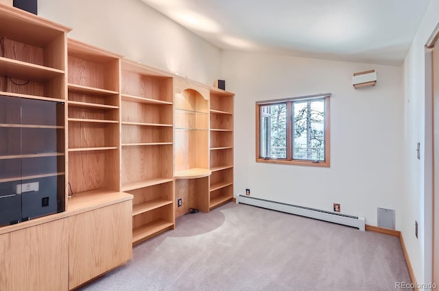 135 Poorman Rd, Boulder, CO 80302 - unfurnished office featuring a baseboard heating unit, lofted ceiling, and light colored carpet