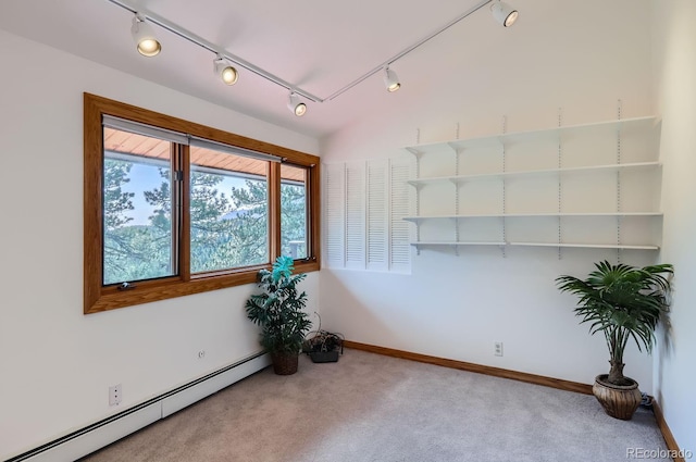 135 Poorman Rd, Boulder, CO 80302 - carpeted spare room featuring baseboard heating and rail lighting