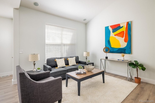 14000 Winding River Ct Unit T3, Broomfield, CO 80023 - living room featuring baseboards and wood finished floors