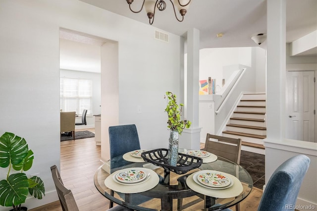 14000 Winding River Ct Unit T3, Broomfield, CO 80023 - dining space featuring wood finished floors and stairway