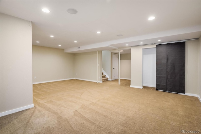 14000 Winding River Ct Unit T3, Broomfield, CO 80023 - finished basement featuring light carpet, recessed lighting, and stairway