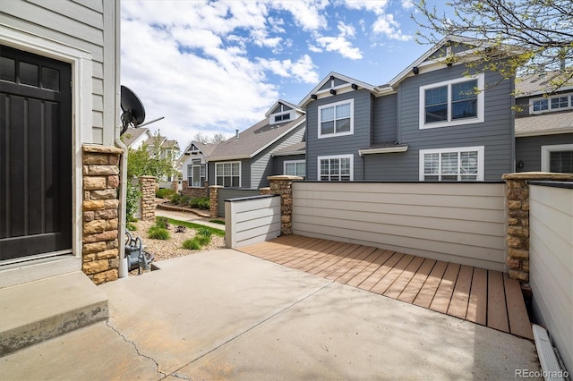 14000 Winding River Ct Unit T3, Broomfield, CO 80023 - view of patio featuring a residential view