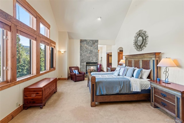 378 Juniata Cir, Breckenridge, CO 80424 - bedroom featuring high vaulted ceiling, multiple windows, and light colored carpet