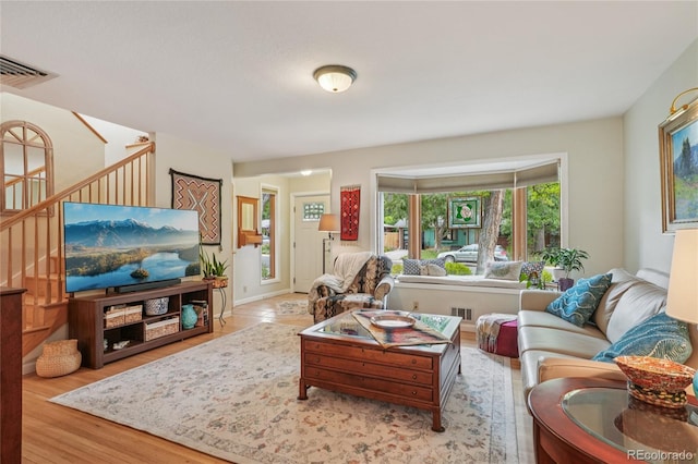 40 S 34th St, Boulder, CO 80305 - living area featuring stairway and wood finished floors