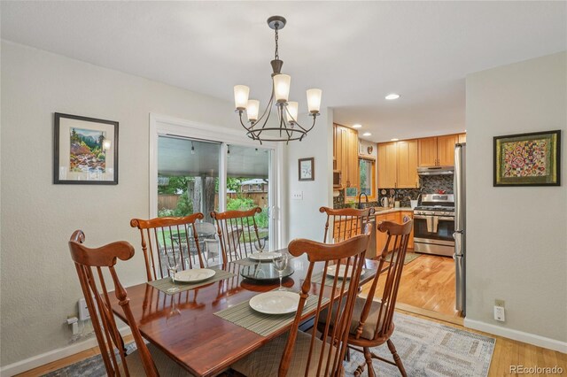 40 S 34th St, Boulder, CO 80305 - dining area featuring a chandelier, light wood-style flooring, and recessed lighting