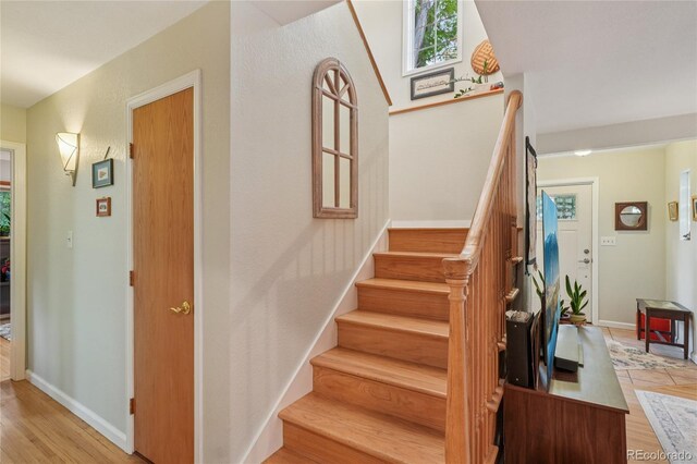 40 S 34th St, Boulder, CO 80305 - stairs with baseboards and wood finished floors