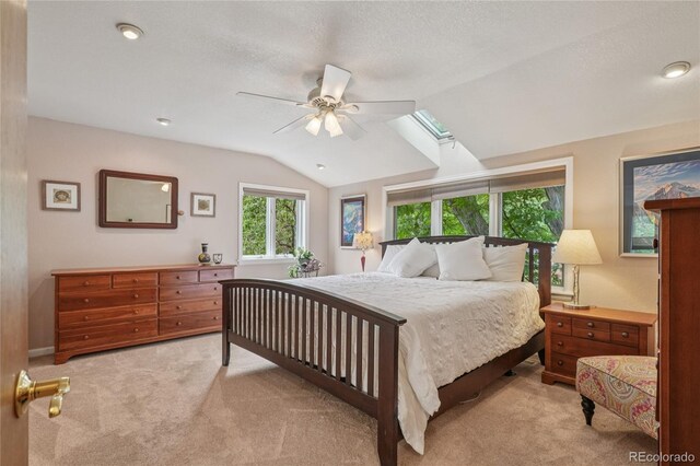 40 S 34th St, Boulder, CO 80305 - bedroom with lofted ceiling, light colored carpet, a ceiling fan, and a skylight