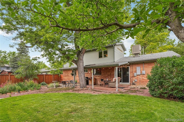40 S 34th St, Boulder, CO 80305 - back of house featuring brick siding and a patio area