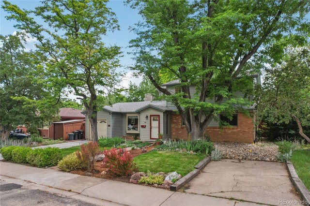 40 S 34th St, Boulder, CO 80305 - traditional-style house featuring an attached garage and brick siding